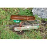 Two small cast iron troughs, 20'' x 14'' and a brass companion set.