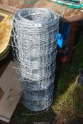 A roll of sheep netting wire.