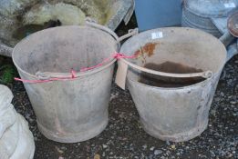 Two heavy duty galvanized buckets with trowels.