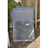 Eight dark grey Marley type roofing tiles, as new, 13'' square.