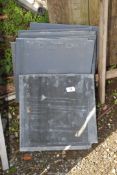 Eight dark grey Marley type roofing tiles, as new, 13'' square.