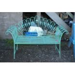 A metal fold up garden Bench with Fleur de Lys decoration, 56'' wide x 40'' high x 18'' deep.