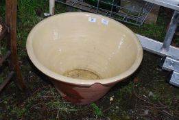 A large Dairy Bowl, with crack and chip.