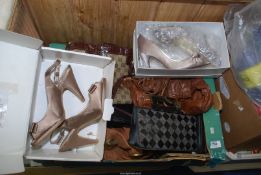 A box of ladies soft brown and formal handbags,
