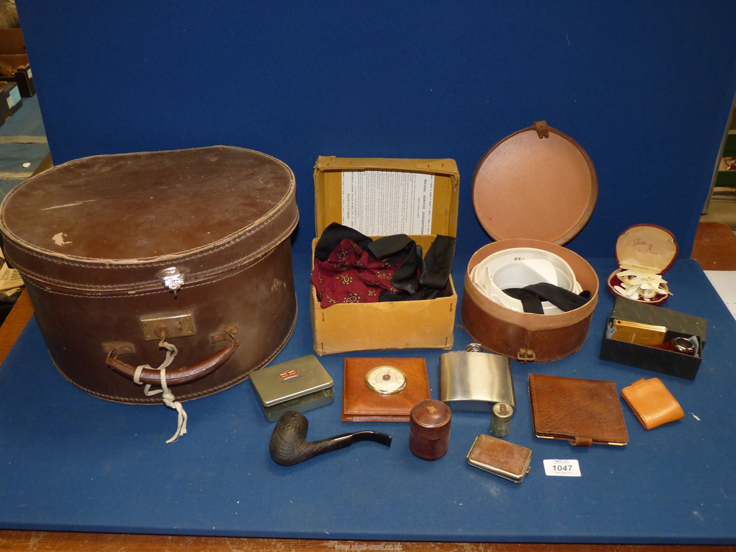 An old Hat Box and contents of collar box including; collars, ties, hip flasks, pipe, wallet, etc.