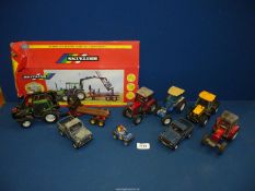 A quantity of Britains models mostly tractors including Valtra Valmet 115 Forest tractor and