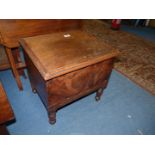 A Mahogany and other woods Box Commode standing on turned legs (unfurnished),