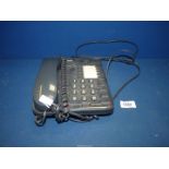 A BT Converse 200 two-piece Telephone in charcoal grey having push button dialing, amplify facility,