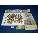 A quantity of Foreign coins and notes including; Francs, Euros, Caribbean, 10 Australian Dollars,