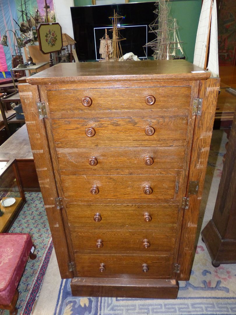 An Oak Wellington Chest having seven drawers with turned wooden knobs, 42" high, - Image 2 of 4
