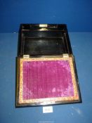 A black lacquer Writing slope/box having floral painted lid with Mother of pearl inset and gilt