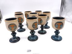 Ten Laugharne Pottery goblets.
