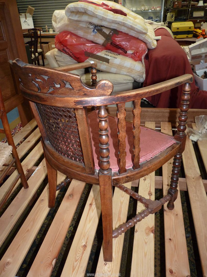 An unusual mixed woods open armed Elbow Chair having a scroll decorated carved and fretworked top - Image 2 of 3