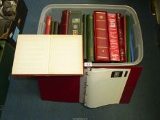 A box containing empty stamp albums; ring binders, stock books, etc.