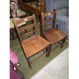 A pair of solid Elm seated early 19th c side/kitchen Chairs.
