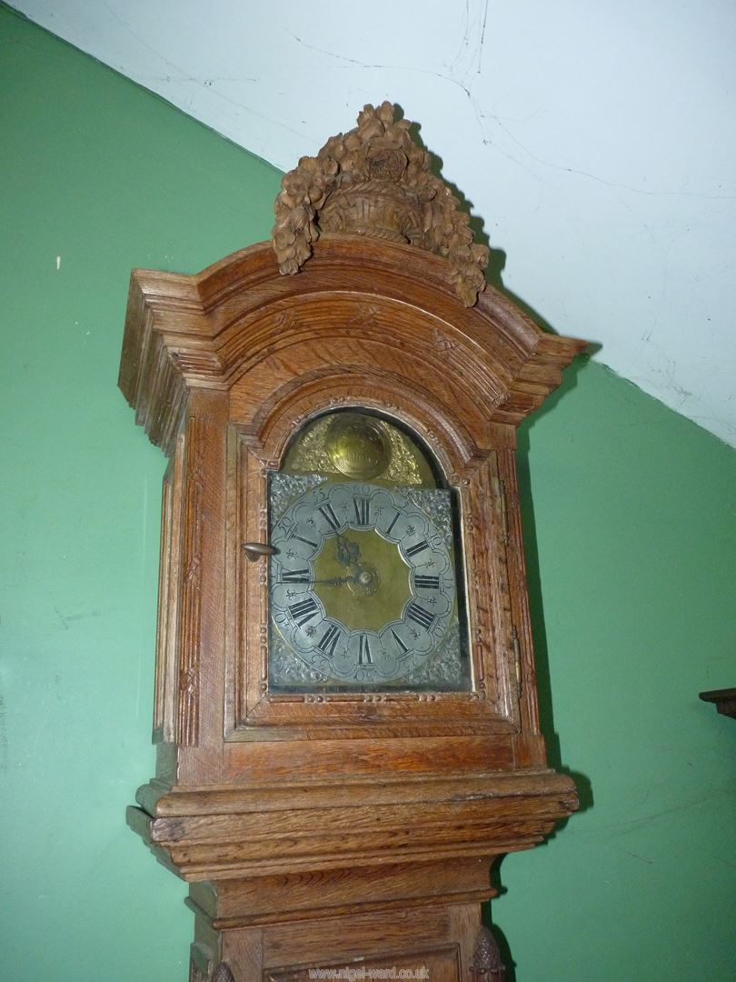 An unusually slender Oak cased long-case Clock, the case decorated in relief with bows and swags, - Image 2 of 7