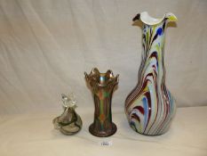 Three pieces of glass ware including Mtarfa Cat paperweight , End of Day vase and Carnival vase.