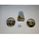 Three small glass Paperweights depicting The Crystal Palace, one being obelisk shaped.
