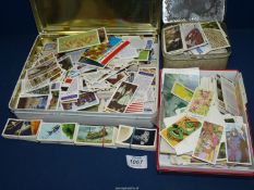 A quantity of tea and cigarette Cards including pictures of animals, birds, cars, butterflies,