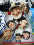 A quantity of Royal Doulton Toby jugs including Long John Silver, Rip Van Winkle and Old salt etc.