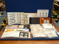 A box containing Channel Isle/Isle of Man stamps to include;