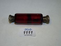 A red glass and white metal double ended Scent Bottle, one stopper (a/f), some dents.