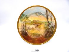 A 1920's Royal Doulton hand painted porcelain cabinet plate depicting Linlithgow Palace Scotland