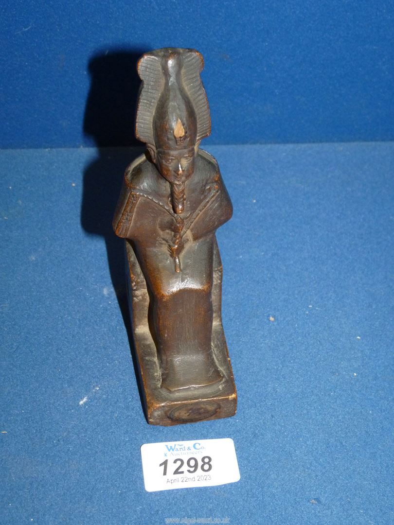 A speculative Egyptian stone figure of a Osiris,