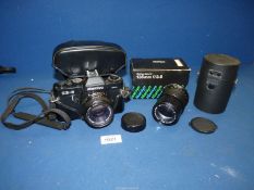 A Mamiya ZE-2 Quartz SLR camera with a Mamiya-Sekor 50mm lens,