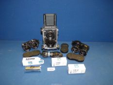 A Mamiya C220 Professional Twin Lens Reflex Camera outfit with Waist Level Finder, original lanyard,