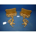 A pair of gilt wood Wall bracket shelves with scroll decoration to lower section,