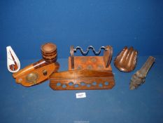 A box of pipe stands and racks including a leather covered stand, a huge pipe ashtray,