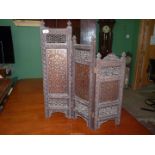 An early and surprisingly heavy beautifully worked three-fold Table Screen in dark and oak and