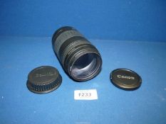 A Canon EOS Zoom Lens EF 90-300mm f/4.5-5.6 with Hoya Skylight Filter, Lens Cap and Back Cap.