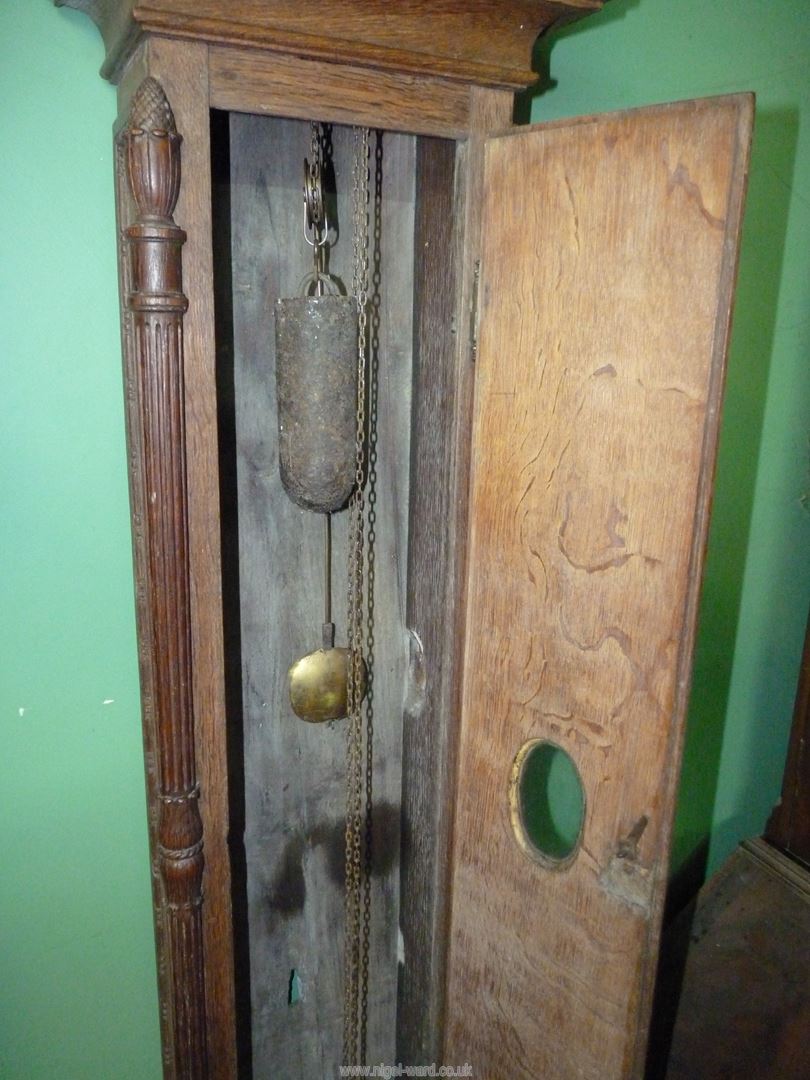 An unusually slender Oak cased long-case Clock, the case decorated in relief with bows and swags, - Image 4 of 7