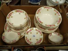 A quantity of Royal Doulton 'Roses' dinner ware including eleven dinner plates, five tea plates,