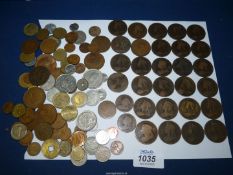 A tin of old coins including; foreign and Great Britain, some Queen Victoria pennies, etc.