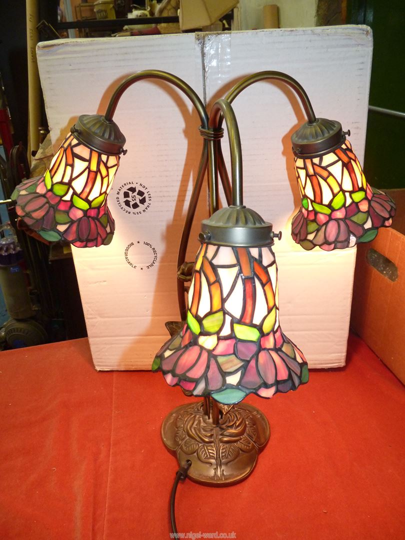 A three branch contemporary Tiffany style table lamp with three floral shades in pinks and green, - Image 5 of 5