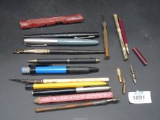 A quantity of Pens including Parker fountain pen, propelling pencil, nibs, wax stick, etc.