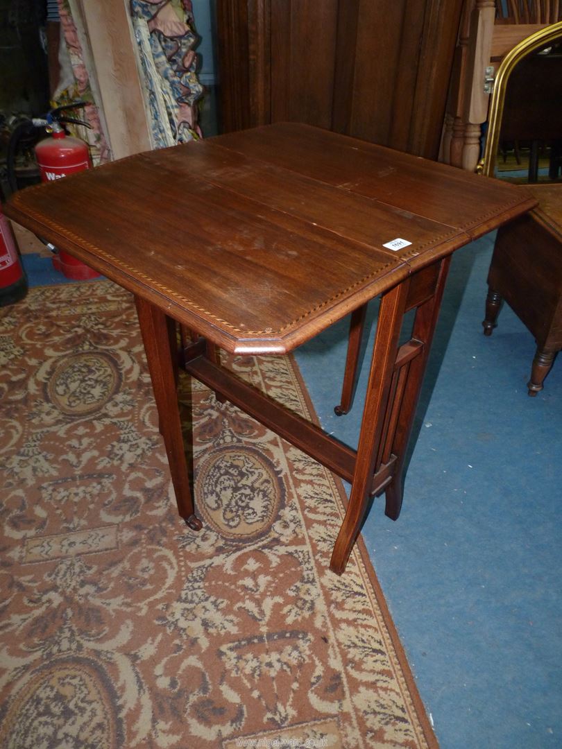 A Mahogany Sutherland Table having light and darkwood rope stringing to the top and raised on - Image 2 of 3