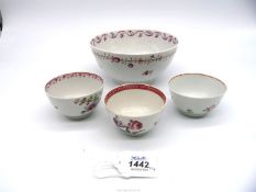 Three early Staffordshire tea bowls and a slop bowl all with similar (not matching) floral designs;
