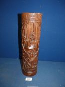 A 19th century tall Chinese bamboo brush Pot with deep carving of prunus, bamboo, figures,