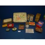 A box of collectible vintage tins.