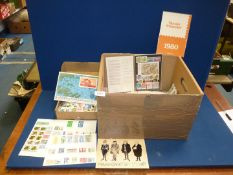 A box with mostly used off paper World stamps, plus five 1980's year packs for Sweden/Iceland.