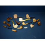 Four antique and vintage highly carved and decorated Meerschaum pipes plus three others,