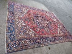A Turkish rug, 124'' long x 97 1/2'' wide, some fading.