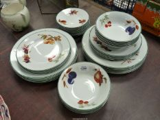A quantity of Royal Worcester Evesham Vale china including eight dinner plates (10 3/4"),