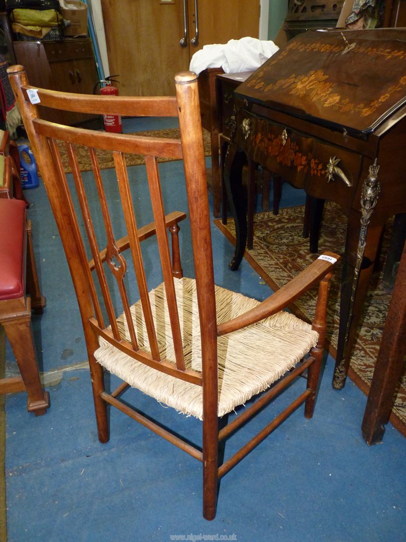 An elegant mixed woods Arts and crafts design open armed Elbow Chair having a fretworked central - Image 3 of 4