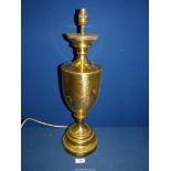 A large baluster shape brass electric Table lamp, 23" tall.