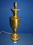 A large baluster shape brass electric Table lamp, 23" tall.